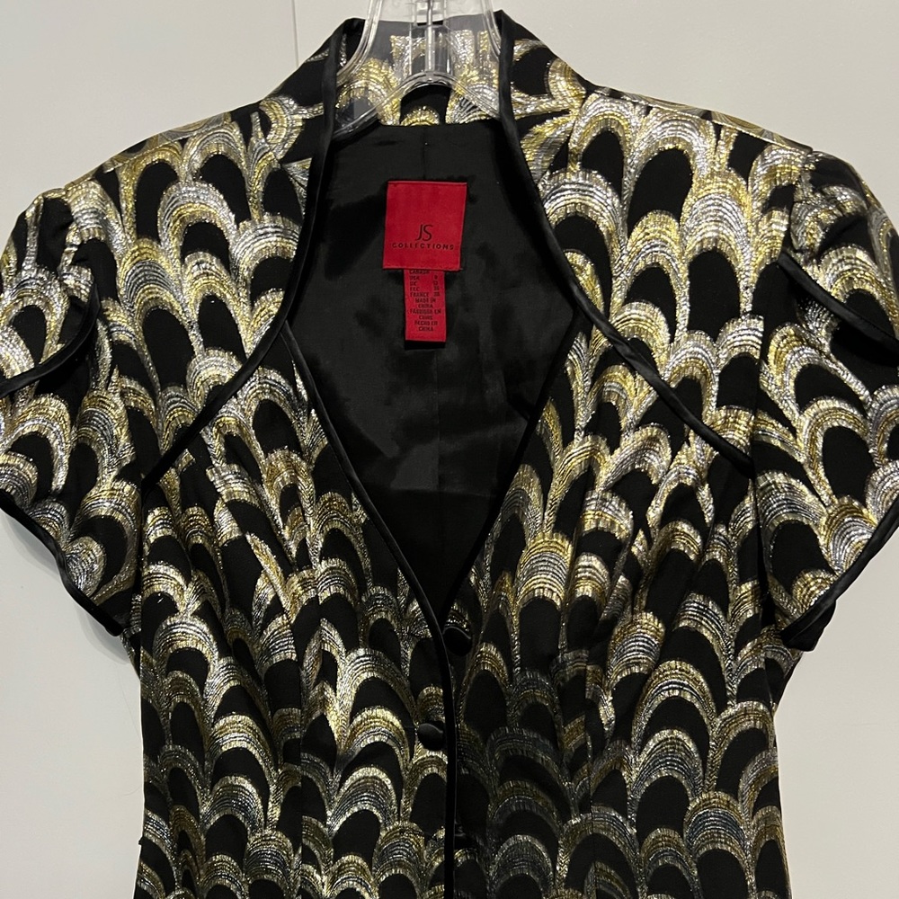 Stunning black and gold top. Perfect for evening wear.
